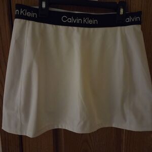Calvin Klein White Athletic Skirt w/shorts under,black band beautiful Condition!